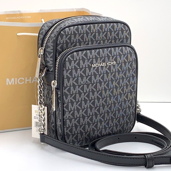 Michael Kors Handbags - MICHAEL KORS
Jet Set Travel Medium Signature Logo Crossbody Bag
COLOR BLACK